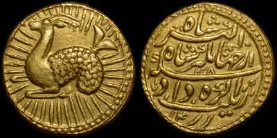 Jahangir zodiac gold coin, zodiac mohur. Obverse: Goat, CAPRICORN. Mythical monster with forepart of goat and trail of fish left; in radiate circle. Reverse: Persian legend, AH year 1028, regnal year 14, Agra mint.