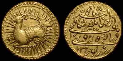 Jahangir zodiac gold coin, zodiac mohur. Obverse: Goat, CAPRICORN. Mythical monster with forepart of goat and trail of fish left; in radiate circle. Reverse: Persian legend, AH year 1032, regnal year 17, Agra mint.