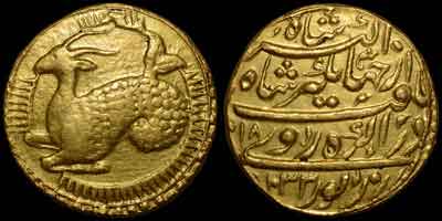 Jahangir zodiac gold coin, zodiac mohur. Obverse: Goat, CAPRICORN. Mythical monster with forepart of goat and trail of fish left; in three parts of radiate circle. Reverse: Persian legend, AH year 1033, regnal year 18, Agra mint.