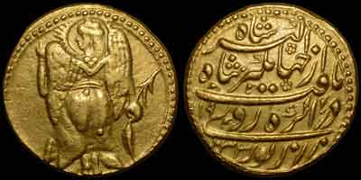 Jahangir zodiac gold coin, zodiac mohur. Obverse: Winged female, VIRGO. Winged maiden, her back facing, head left surrounded by solar rays, an ear of corn in her right hand, left hand streiched. Reverse: Persian legend, AH year 1033, regnal year 19, Agra mint.