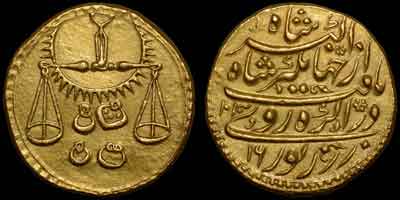 Jahangir zodiac gold coin, zodiac mohur. Obverse: Scales, LIBRA. Scale with four weights with radiate circle. Reverse: Persian legend, AH year 1030, regnal year 16, Agra mint.