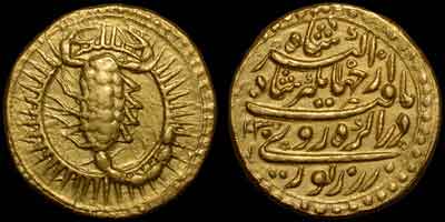 Jahangir zodiac gold coin, zodiac mohur. Obverse: Scorpion, SCORPIO. Scorpion tail to right surrounded by solar rays. Reverse: Persian legend, AH year 1030, regnal year 16, Agra mint.