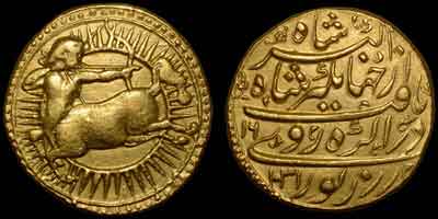 Jahangir zodiac gold coin, zodiac mohur. Obverse: Archer, SAGITTARIUS. Centaur left facing backwords and shooting arrow from stretched bow surrounded by solar rays. Reverse: Persian legend, AH year 1031, regnal year 16, Agra mint.
