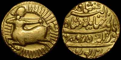 Jahangir zodiac gold coin, zodiac mohur. Obverse: Archer, SAGITTARIUS. Centaur left facing backwords and shooting arrow from stretched bow surrounded by solar rays. Reverse: Persian legend, no date, Agra mint.
