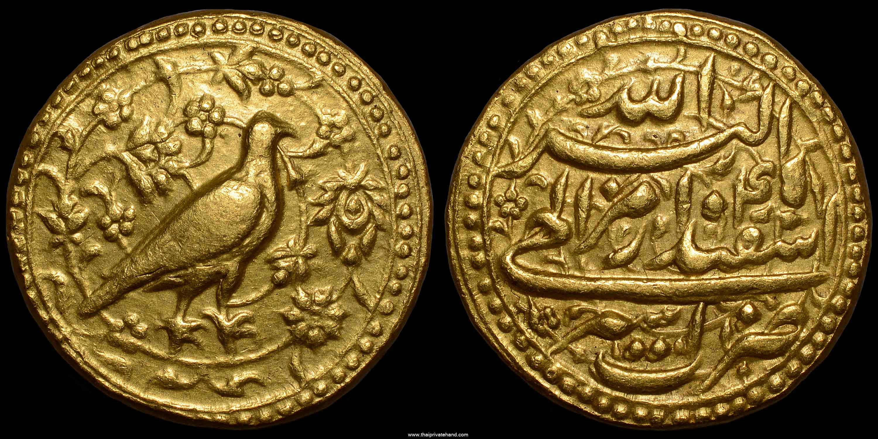 Gold coin of Akbar figure hawk mohur mughal empire